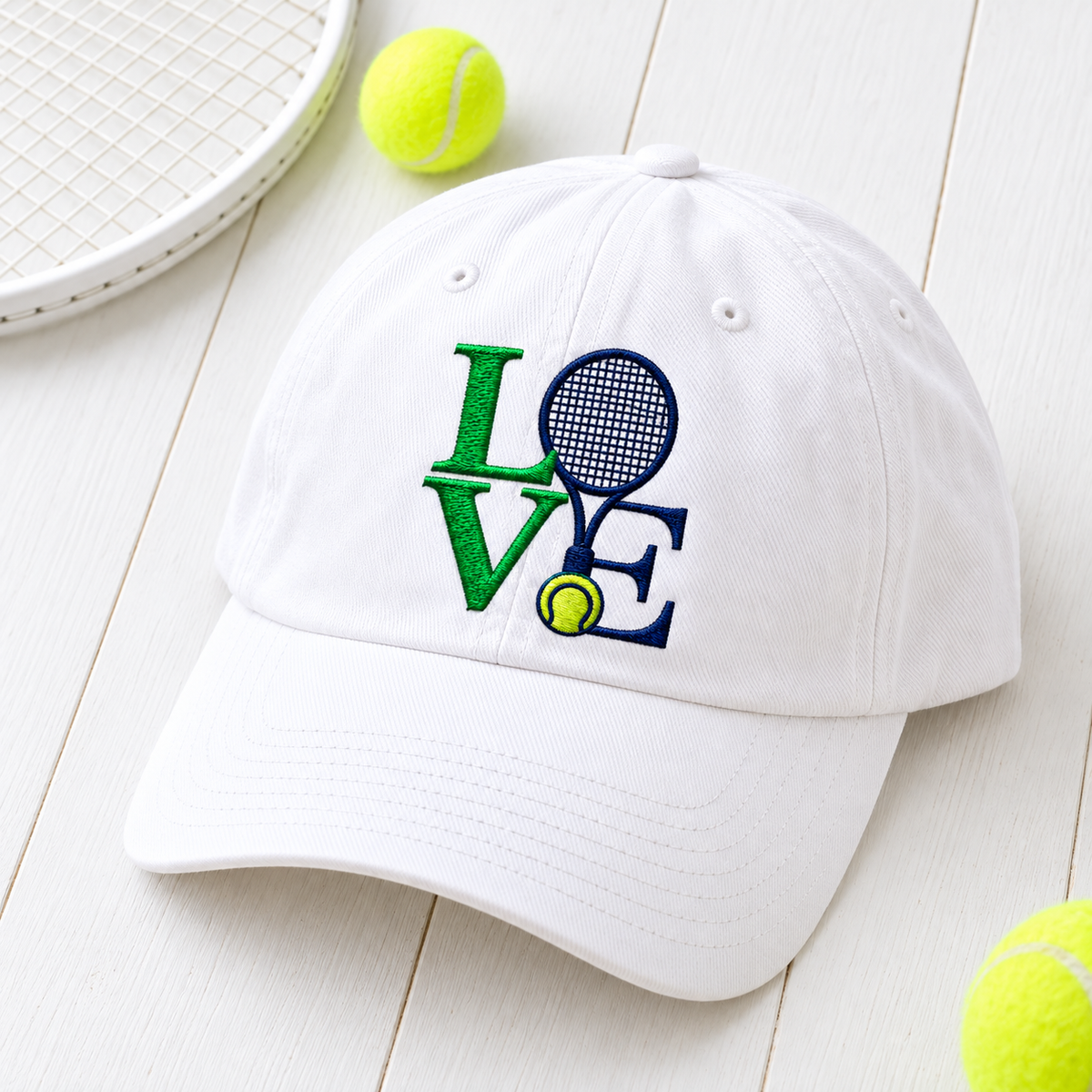 love hat embroidered white headwear hero on white wood with tennis props